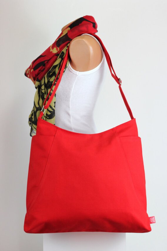 red canvas hobo bag