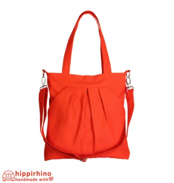 Vibrant orange textile shopper spacious wrinkled texture washable shoulder sling large crossbody tote bag external pocket accessory bright hue purse bolso naranja grande plisado lavable bandolera sac cabas orange plissé grande poche waschbare orange faltentasche große umhängetasche borsa arancione pieghe tracolla lavabile oranje plooitas schoudertas حقيبة كتف برتقالية كبيرة