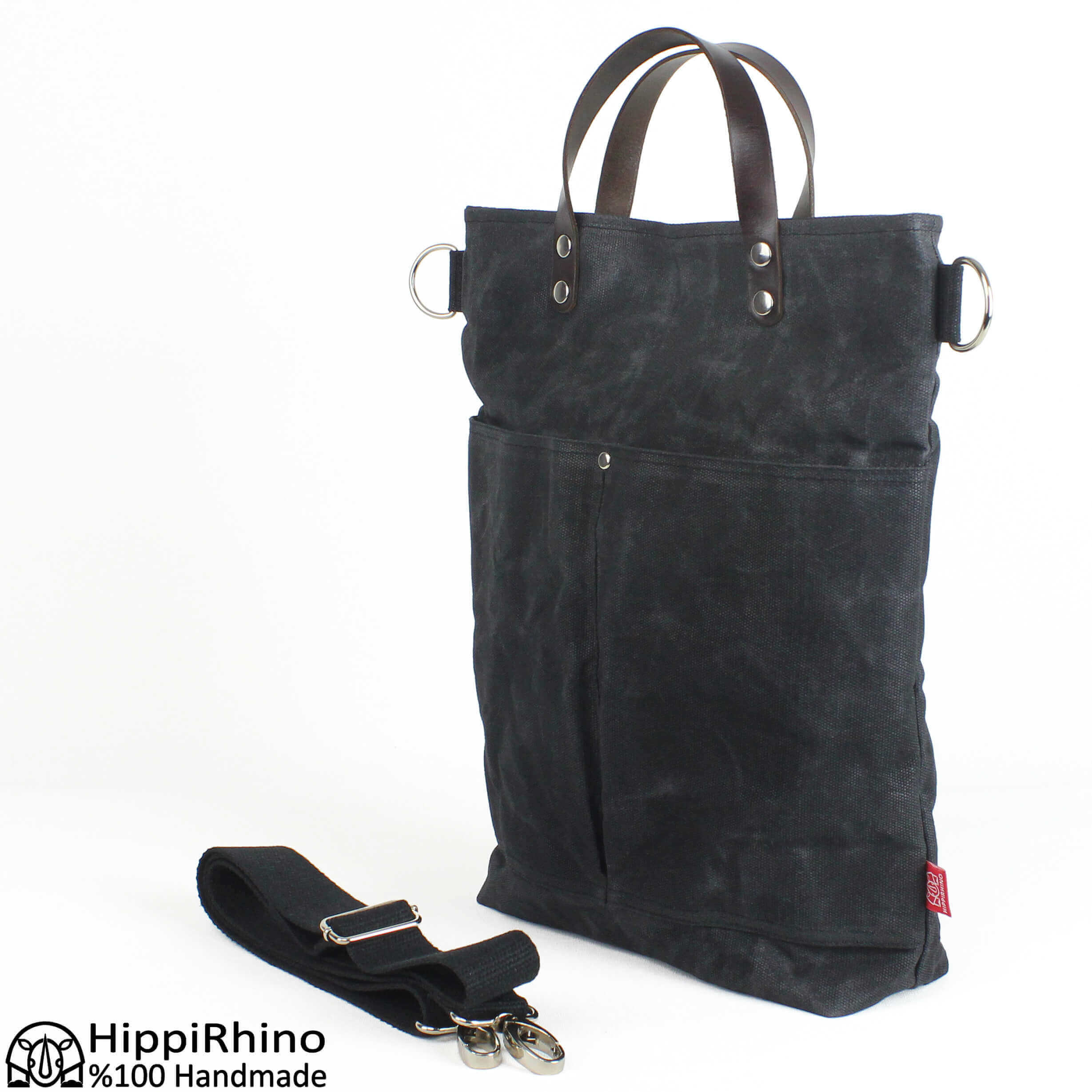 Webbing and leather-trimmed embroidered canvas tote